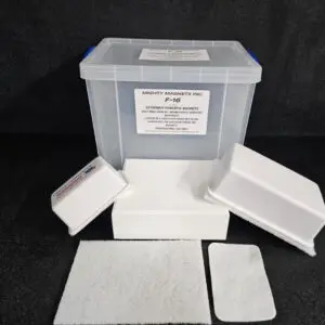 Image of a clear plastic container labeled "F-9 1-3/4″ (4.4 cm) to 2-1/4″ (5.7 cm)" accompanied by various white foam and fabric-like materials on a black background.